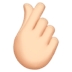 🫰🏻 hand with index finger and thumb crossed: light skin tone display on Apple